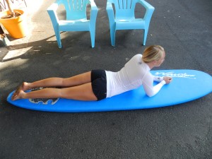 paddle on a surfboard
