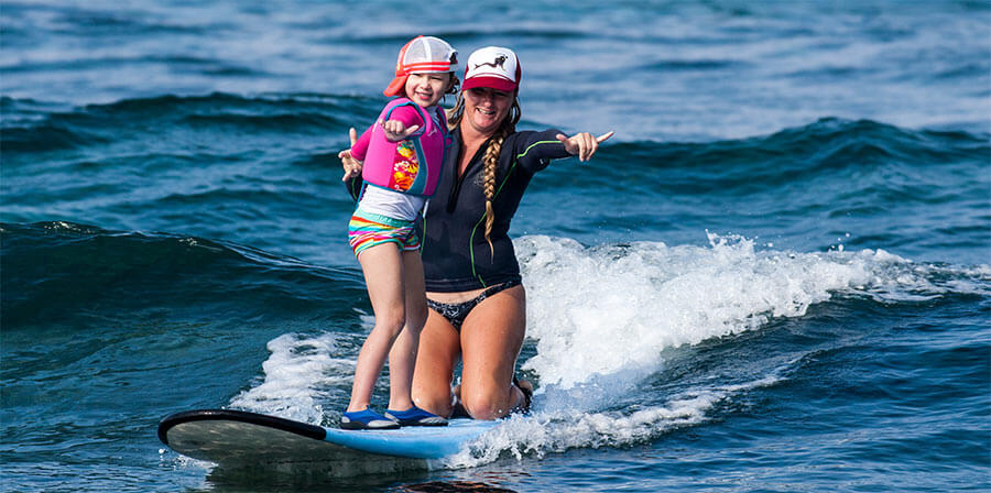 tandem surfing lesson with kid